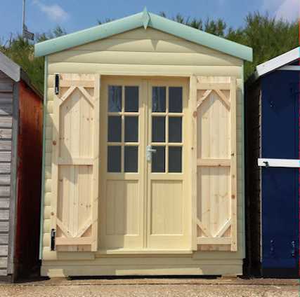 Beach hut with internal glazed doors